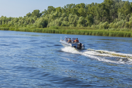 people on a boat in a river